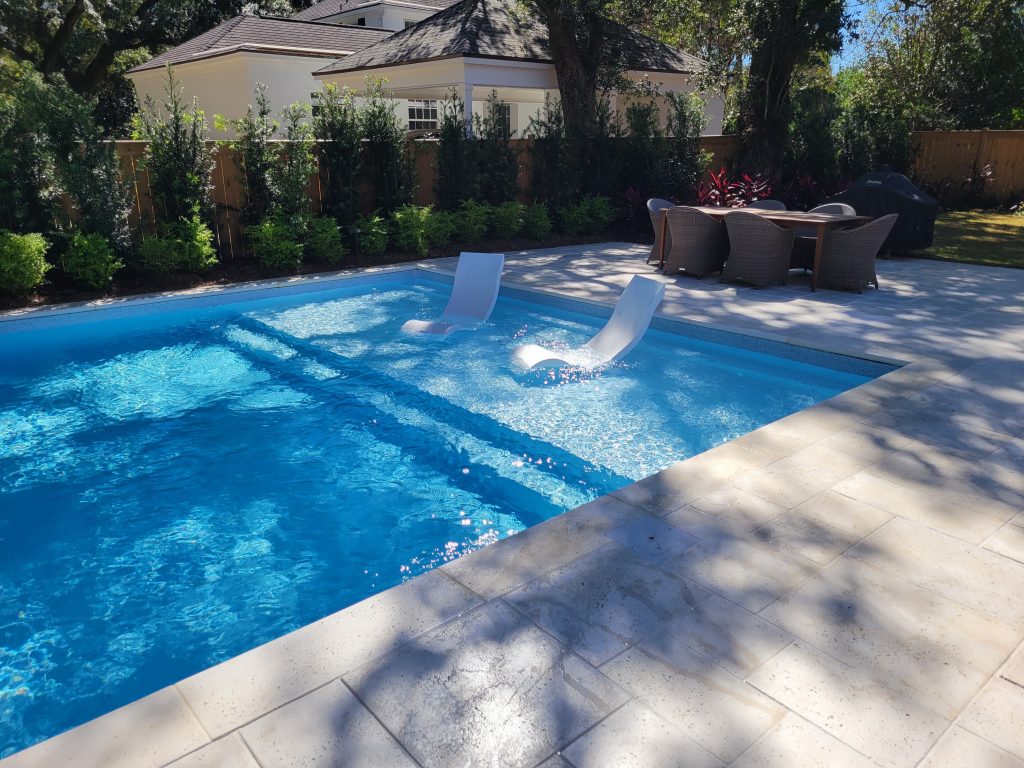 Stunning Backyard Pool with Tanning Ledge
