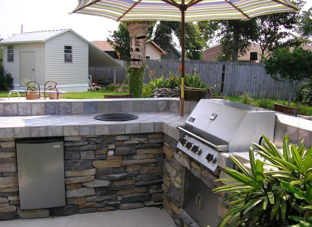 Elegant Backyard Oasis with Pool and Outdoor Kitchen