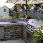 Elegant Backyard Oasis with Pool and Outdoor Kitchen
